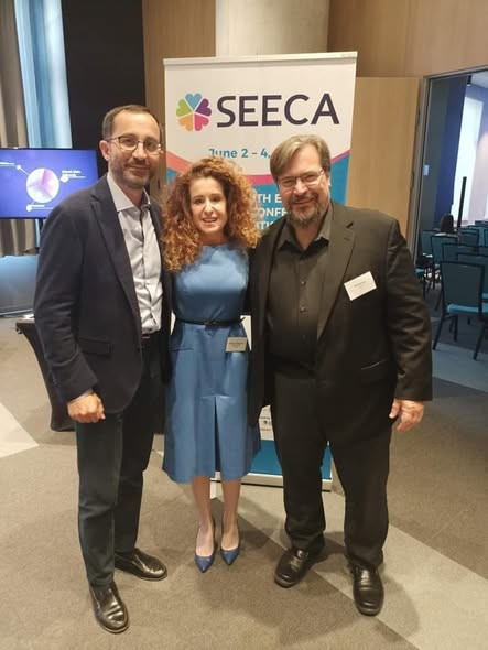 Katarzyna Grzegrzółka with Dr Richard Frye and Dr Nicola Antonucci at SEECA 2022